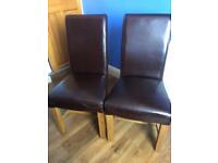 4 solid oak leather scroll back dining chairs