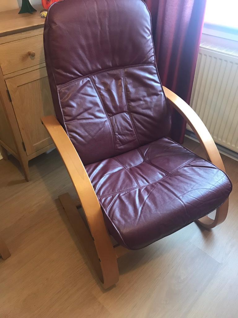 Reading/rocking chair with solid wood frame and leather look upholstery
