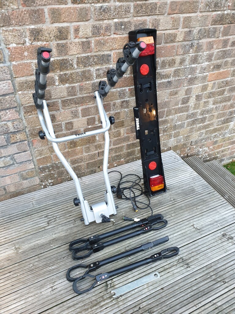 Thule 4 bike rack for towbar with light board, lock and 4 false