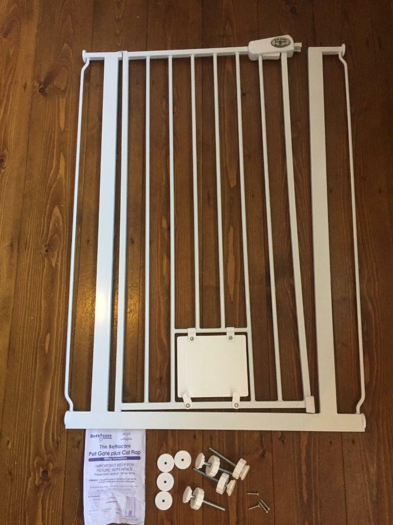 Tall pet gate with lockable cat flap in Gainsborough, Lincolnshire