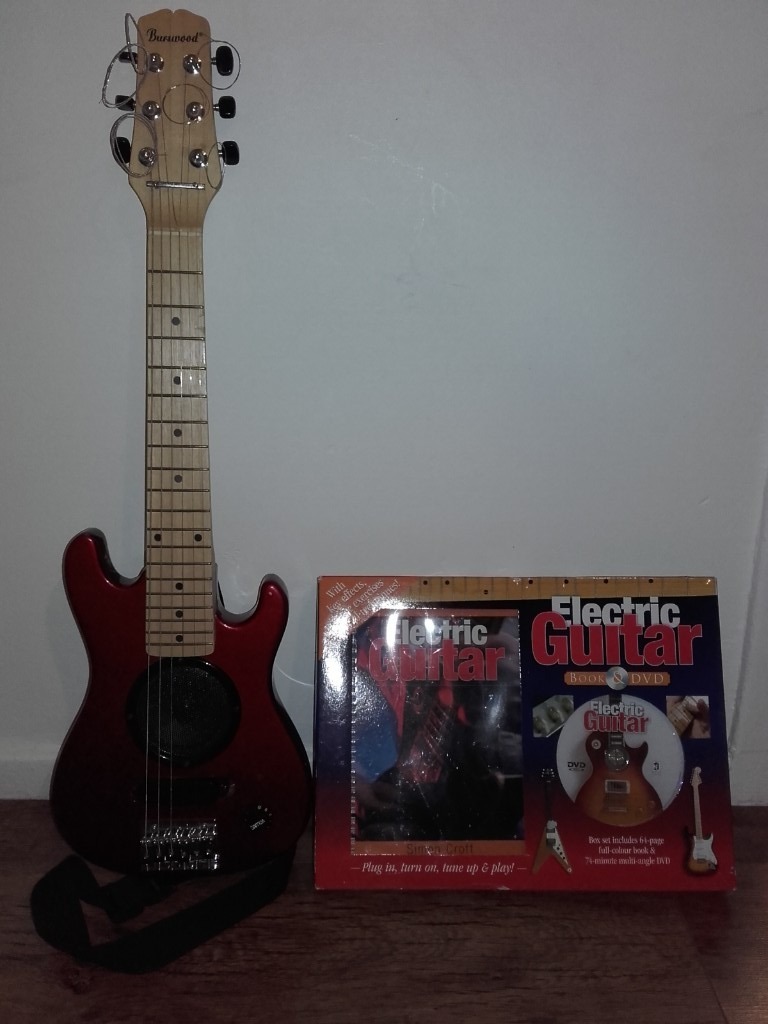 burswood-1-2-size-electric-guitar-with-built-in-amp-and-new-strings