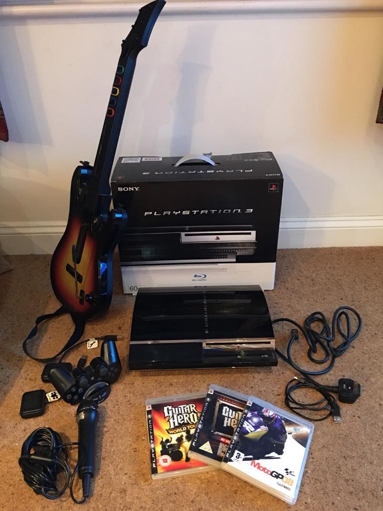 Sony PlayStation 3 60GB Piano Black with Guitar Hero in Swindon