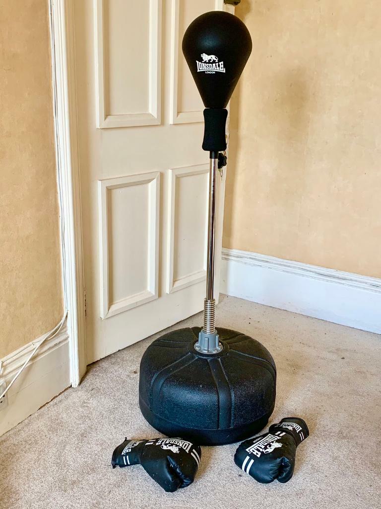 Lonsdale punch bag on stand and boxing gloves in Send, Surrey Gumtree