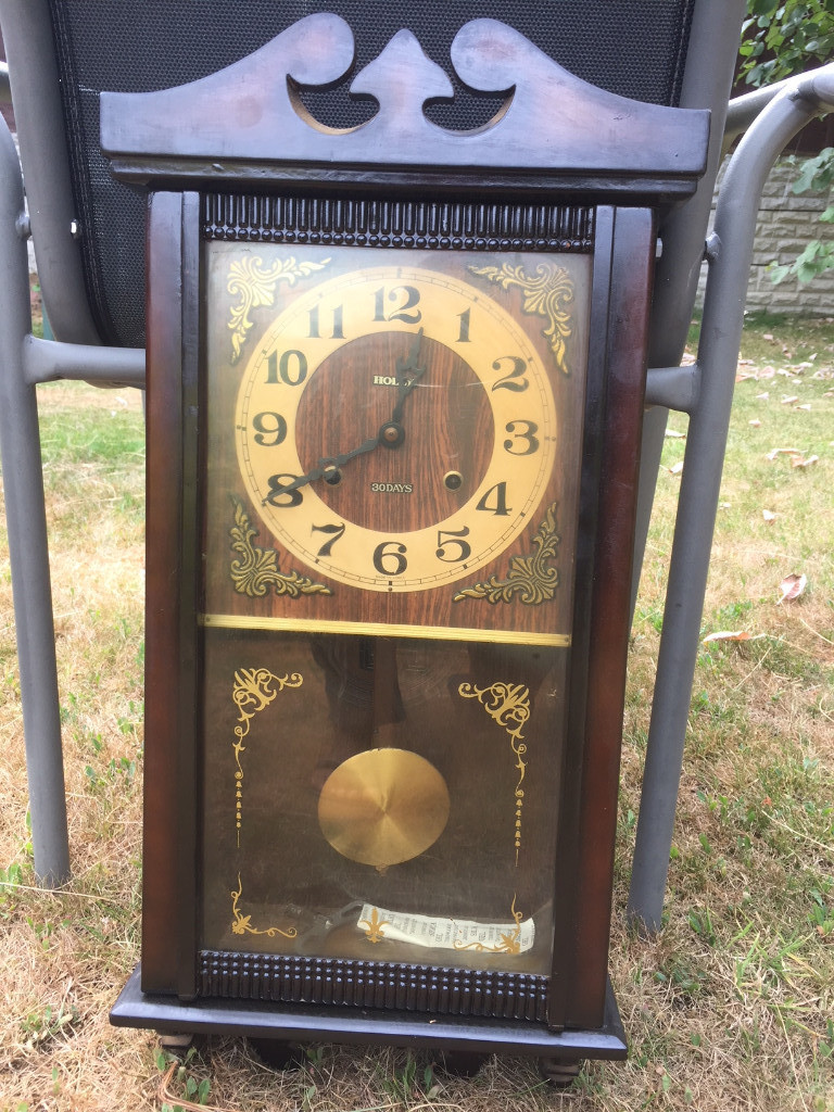 Neat Pendulum Wind up Wall Clock, works well, keeps good time