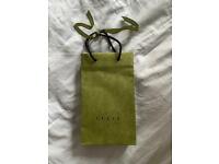 Gucci shopping bag with gucci ribbons
