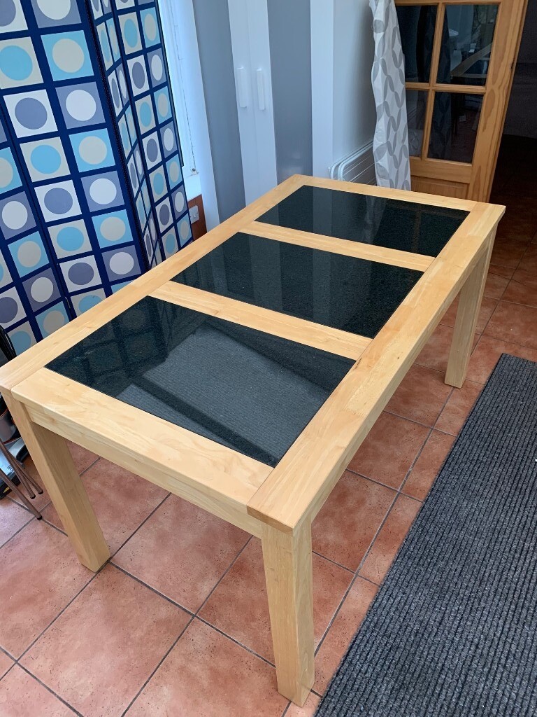 4-6 seat wooden dining table with black granite inlays | in Tiverton