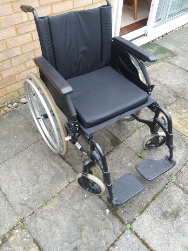 Invacare Action 3 Wheelchair (used) with removable padded seat. in
