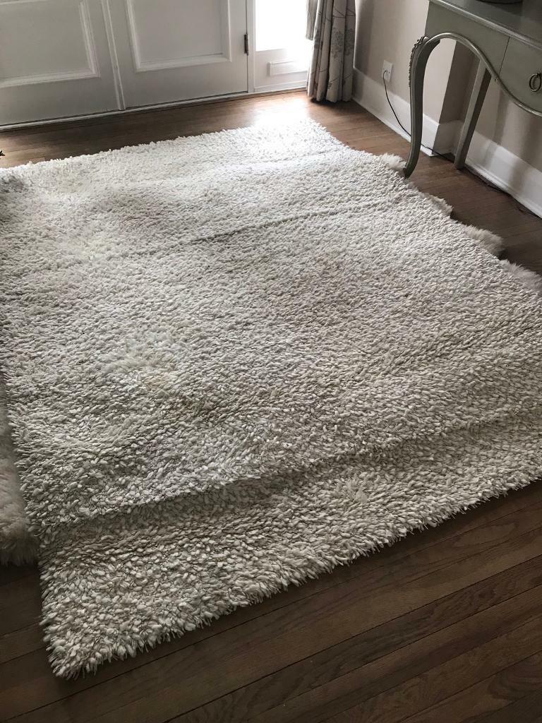 Pure wool cream rug in Claygate, Surrey Gumtree