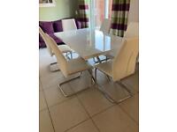 White gloss dining table with 6 chairs