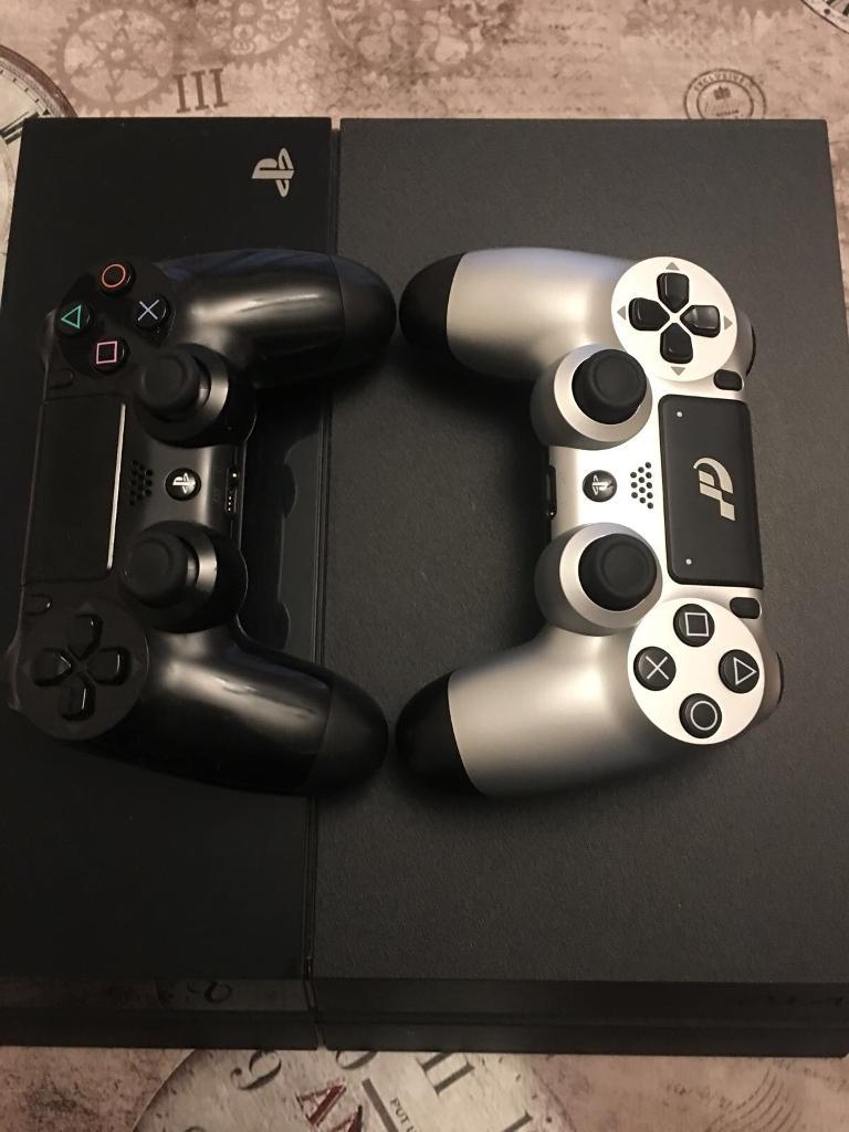 Pristine condition PS4 500Gb with two controllers and 8 games in
