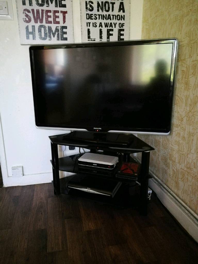 Philips TV+black glass tv stand Preowned in Manchester Gumtree