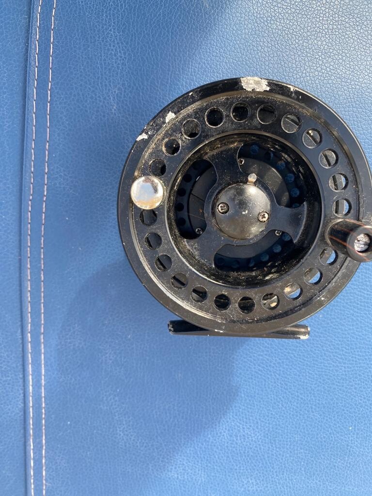 reel fishing fly ended ad