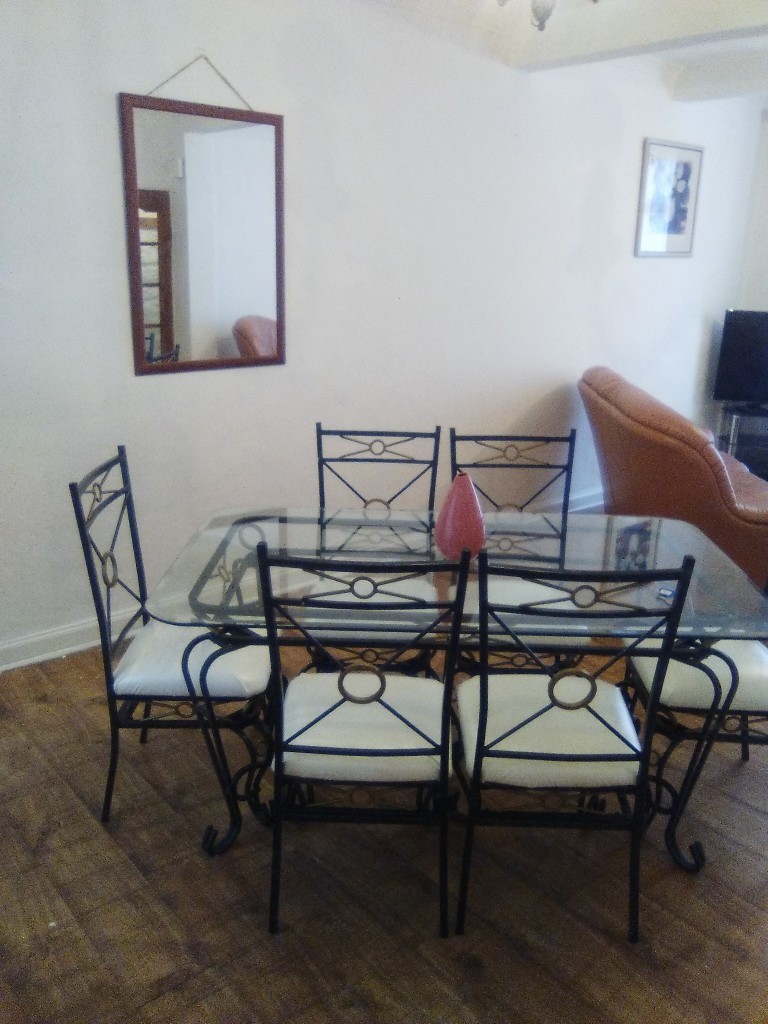 Glass table, 6 white leather seated chairs, coffee table ...
