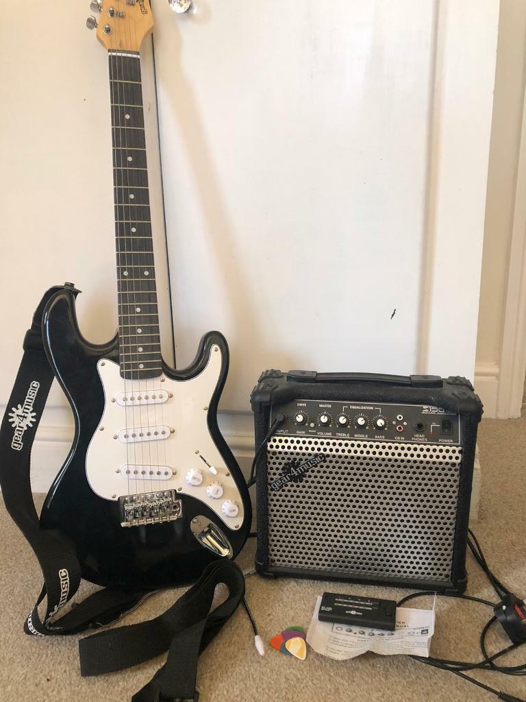 3/4 electric guitar and amp with all cables and auto tuner in