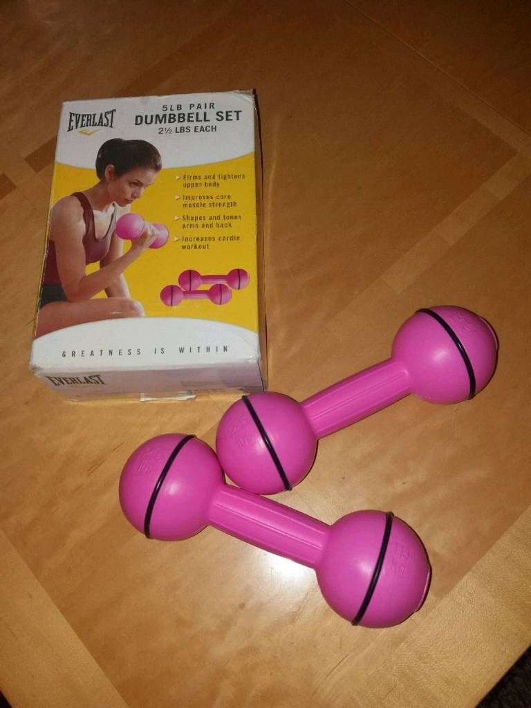 pink dumbbell set with rack