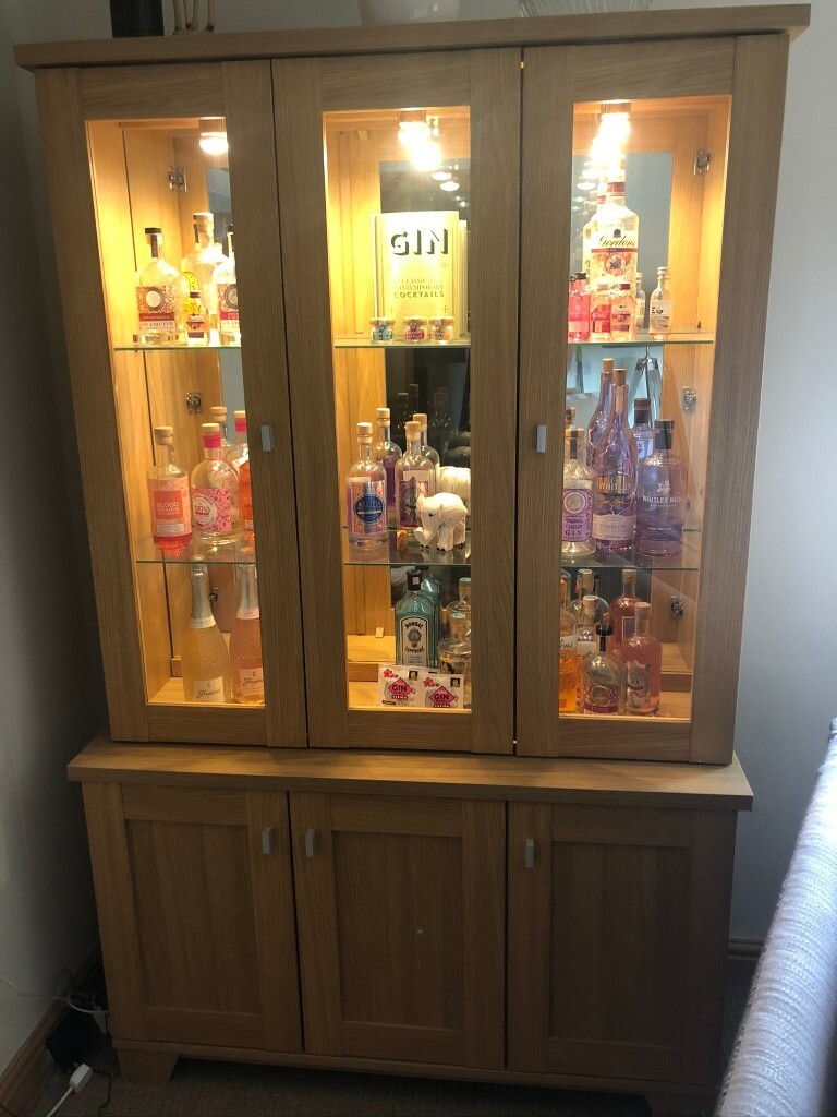 OAK VENEERED DISPLAY MIRRORED BACK AND LIGHTS in Sandiacre