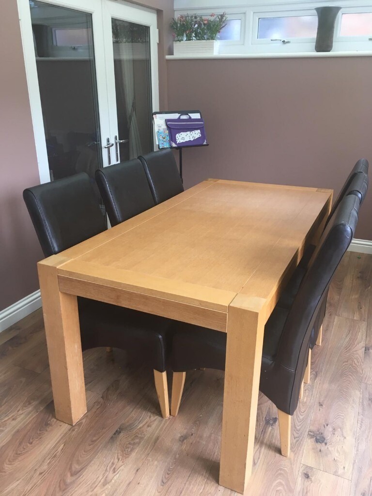 Oak veneer dining room table and chairs in Brentwood, Essex Gumtree