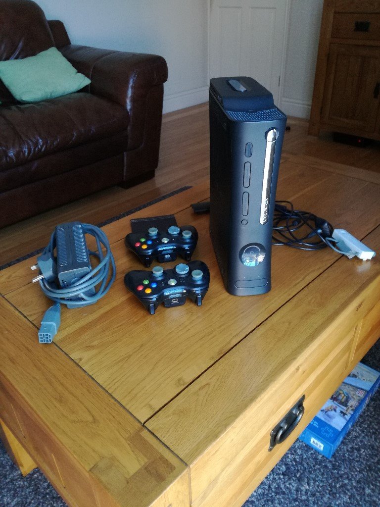 xbox 360 + two controllers + power packs in Newcastle, Tyne and Wear