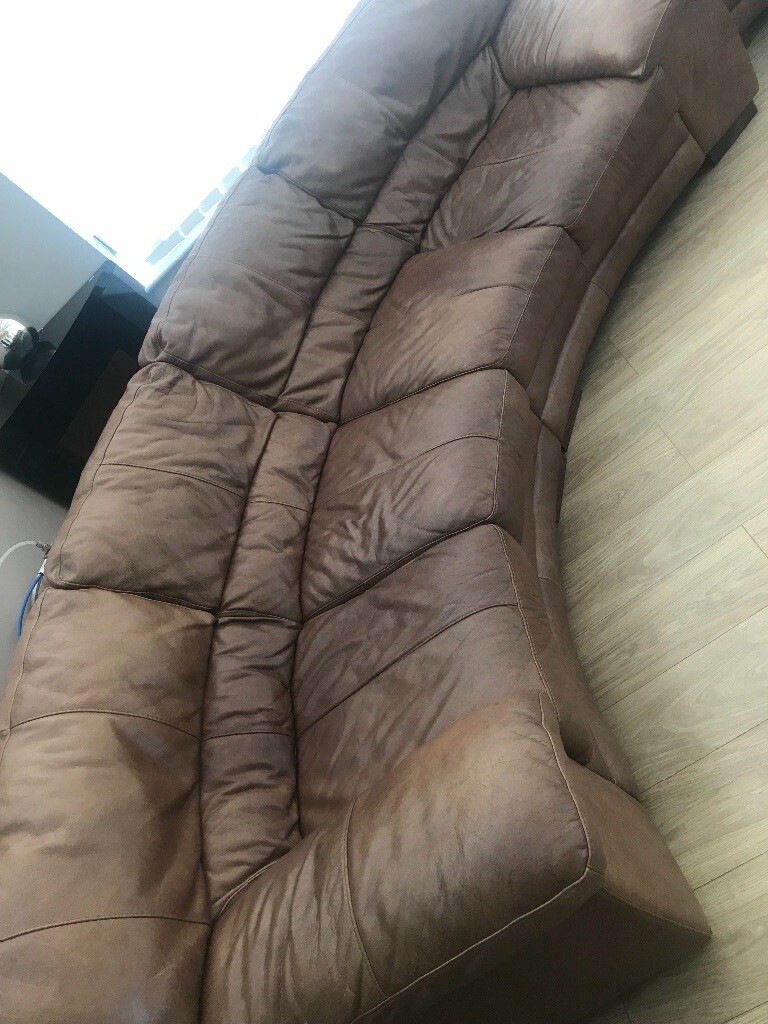 4 seater curved brown leather sofa in Sheffield, South Yorkshire
