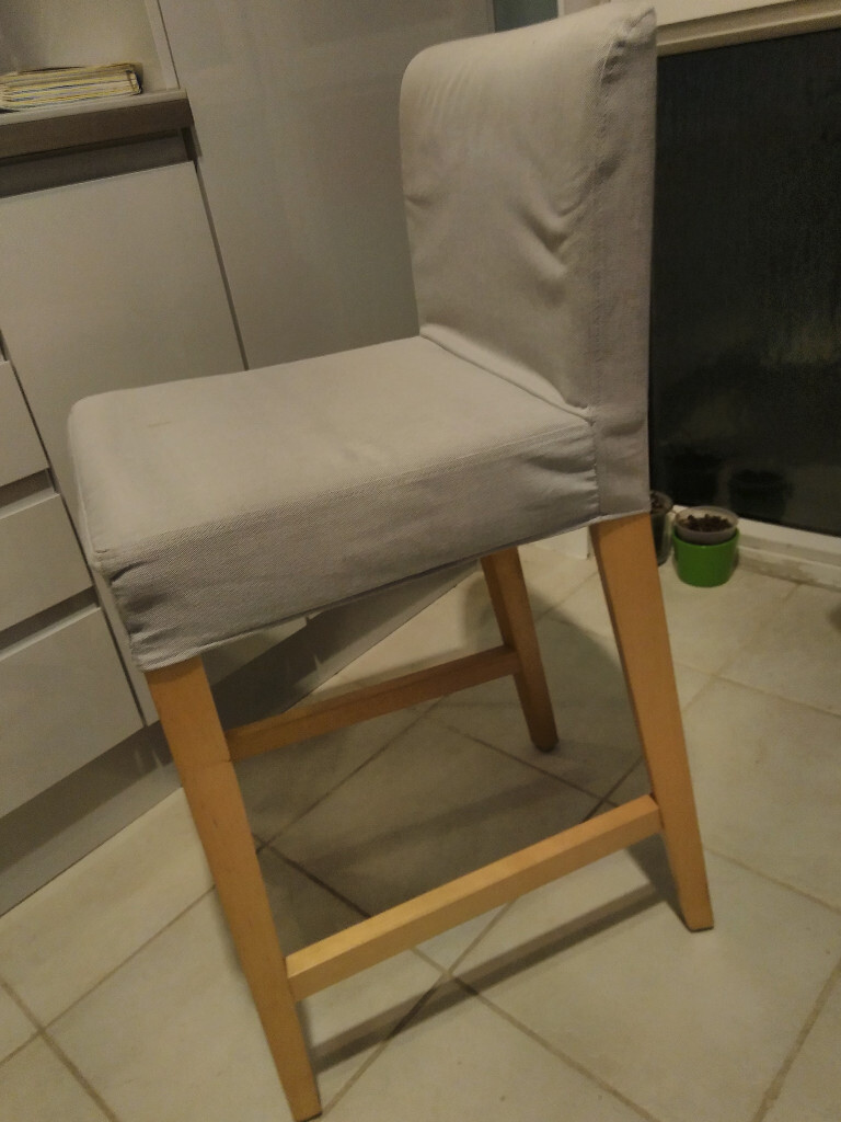 Pair of Ikea HENRIKSDAL bar stools with beechwood legs and removable