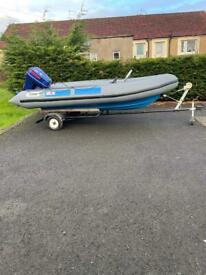 Avon Searider 4.0 M with Evinrude 50 hp outboard.