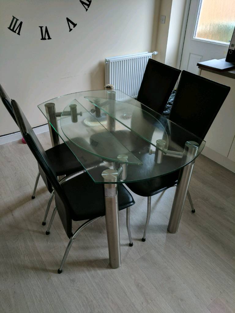 Harveys glass table with 4 chairs in Stafford, Staffordshire Gumtree
