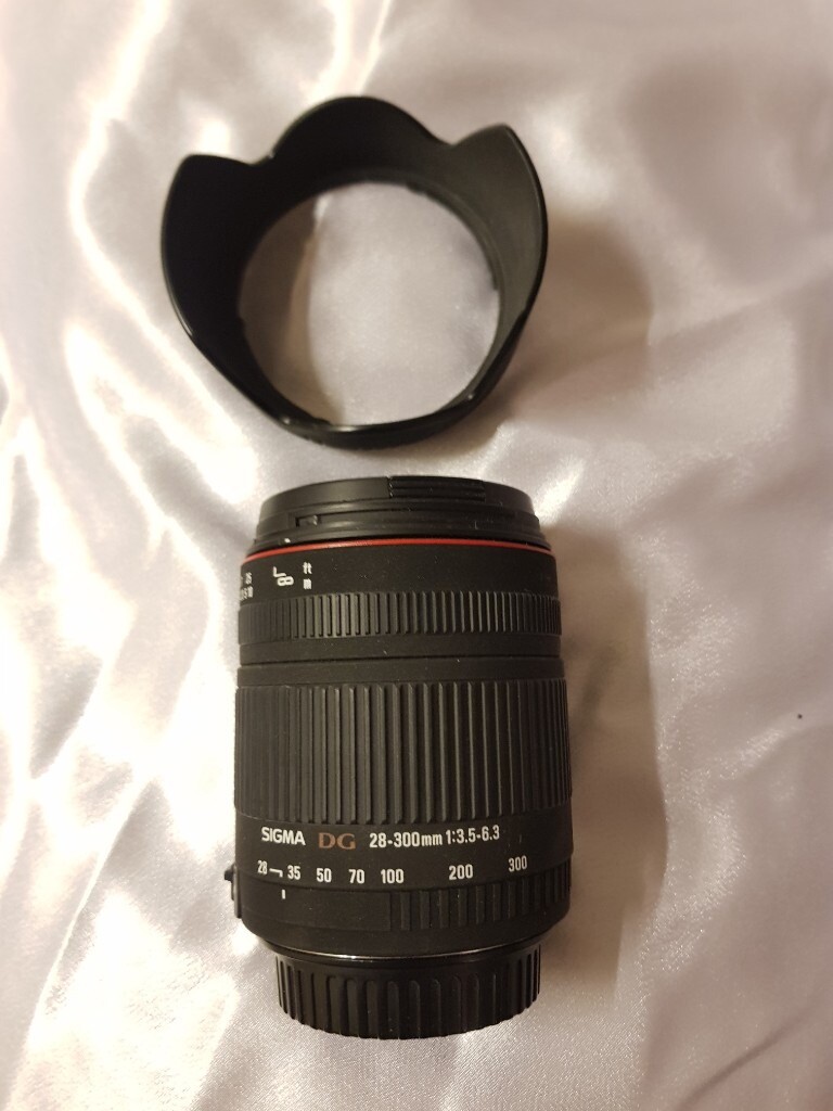 Sigma EF 28300mm F3.5 6.3 DG macro Lens, Canon EF mount, and