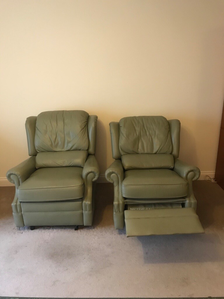 Two green leather recliners as seen in the pictures in Exeter, Devon