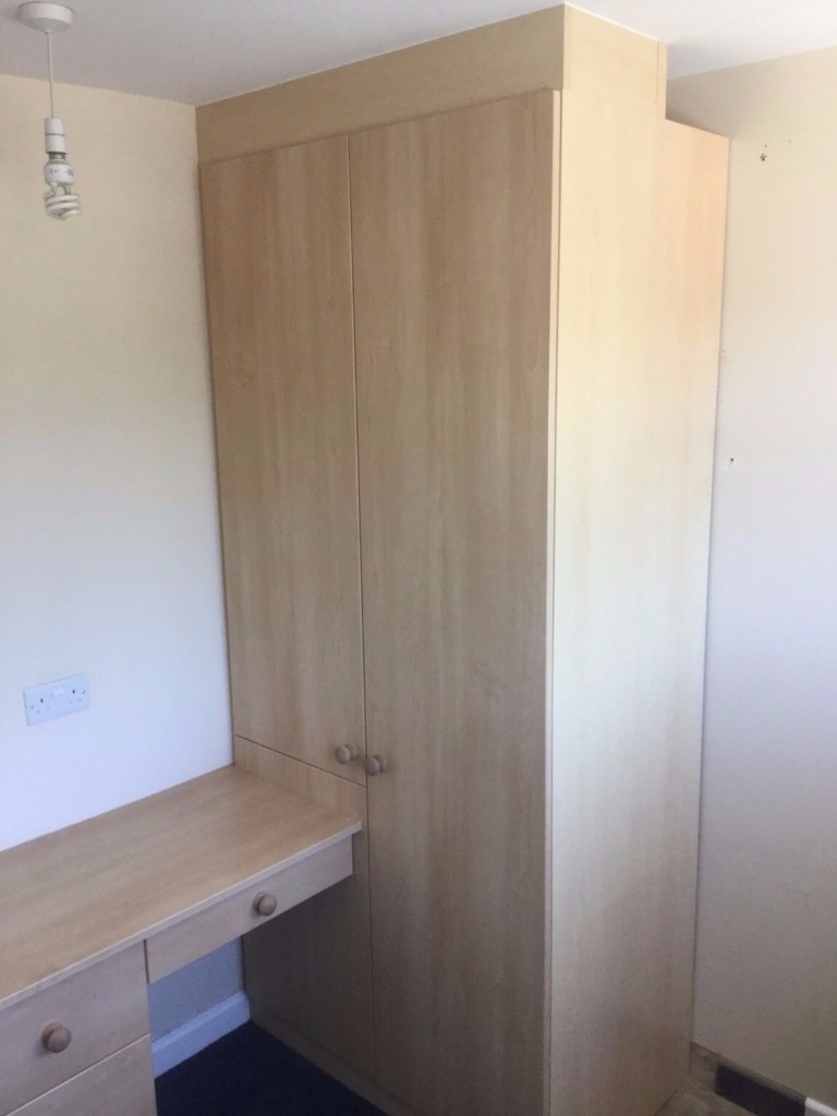 Fitted Wardrobe Over Bed Cupbaord Desk And Bedside Table In