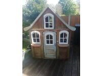 KidKraft Forestview Wooden Outdoor Playhouse with Ringing Doorbell and Bench
