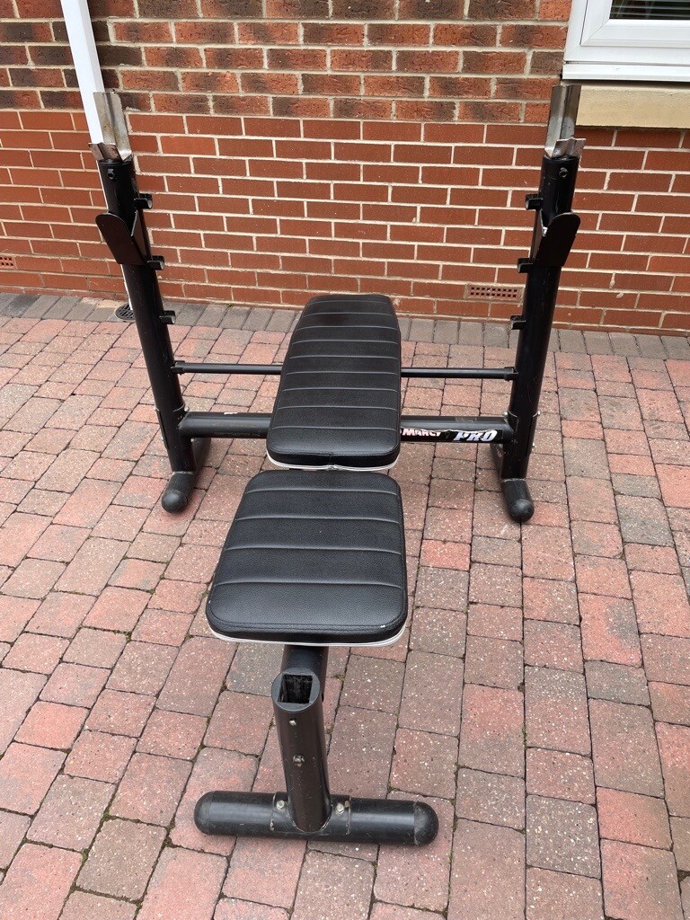 Marcy Pro Olympic Bench with leg extension and leg curl attachments