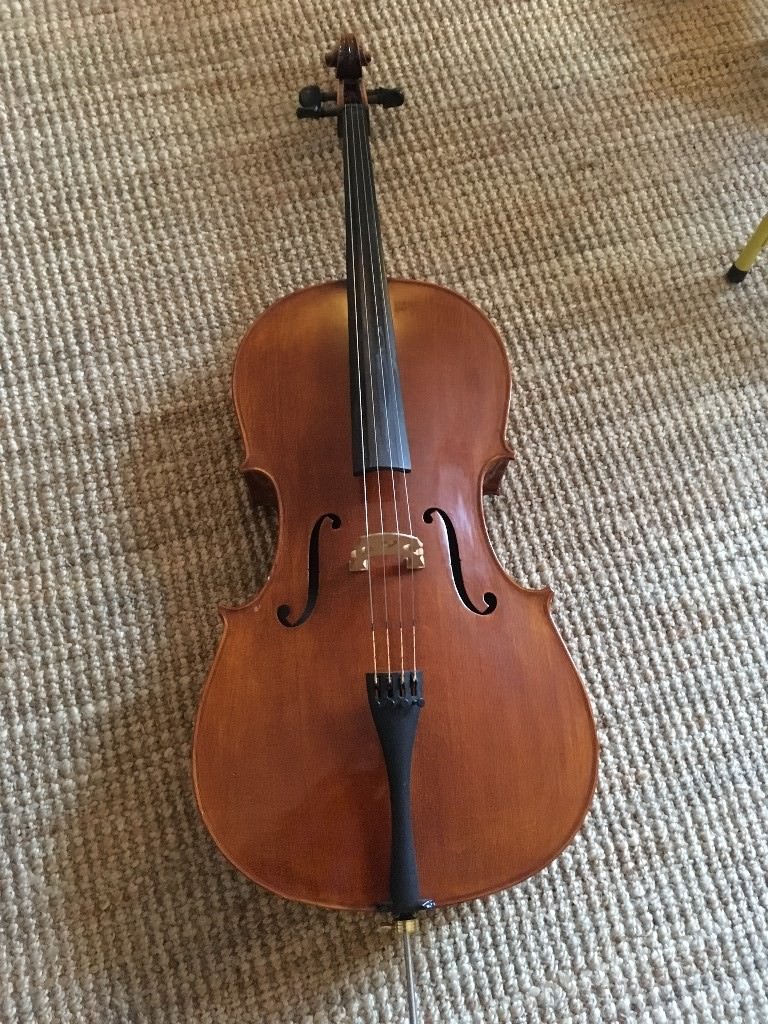 Cello and bow for sale. I've given up playing my cello and I want it to