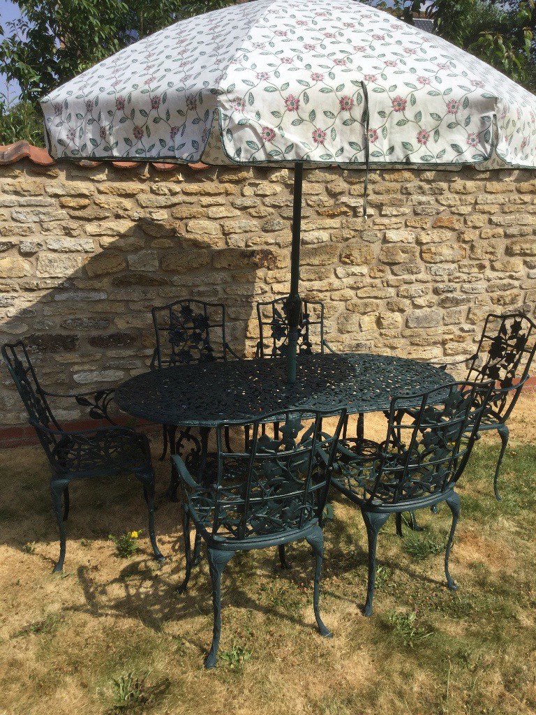 NOVA Cast Alluminium Garden Table, 6 Chairs & Wind up Parasol & cast