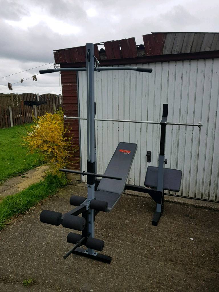 Weider pro bench and metal weights and bars in Bradford, West