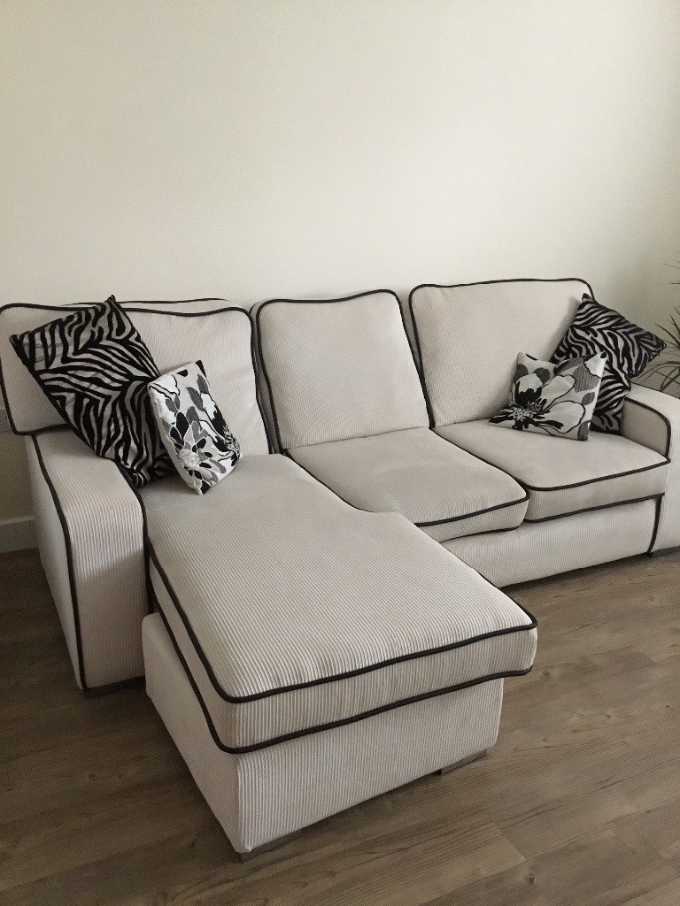 Cream corner sofa with black pipping detail in West Sussex Gumtree
