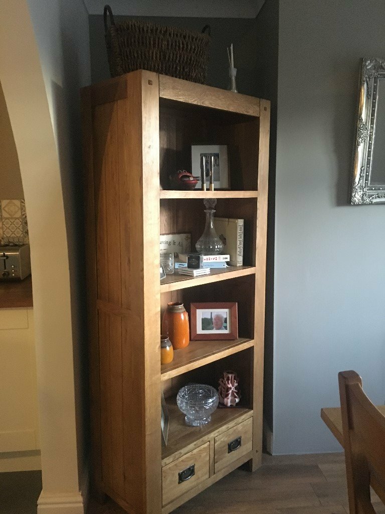 Oak furniture land unit and matching dining table with 6 chairs in