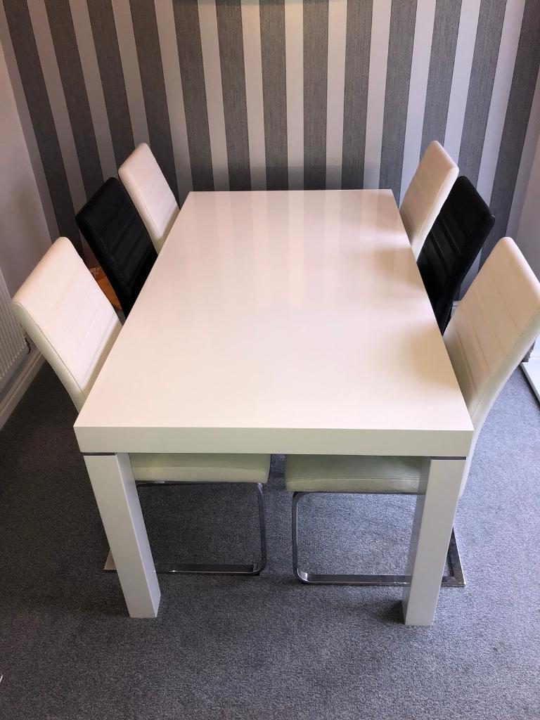 Harveys white high gloss dining table with 6 chairs | in Ingleby