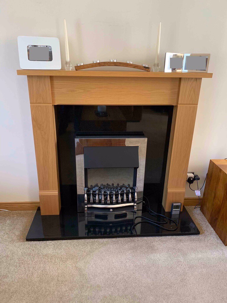 Electric Fire With Surround and Granite Back Panel in Inverness
