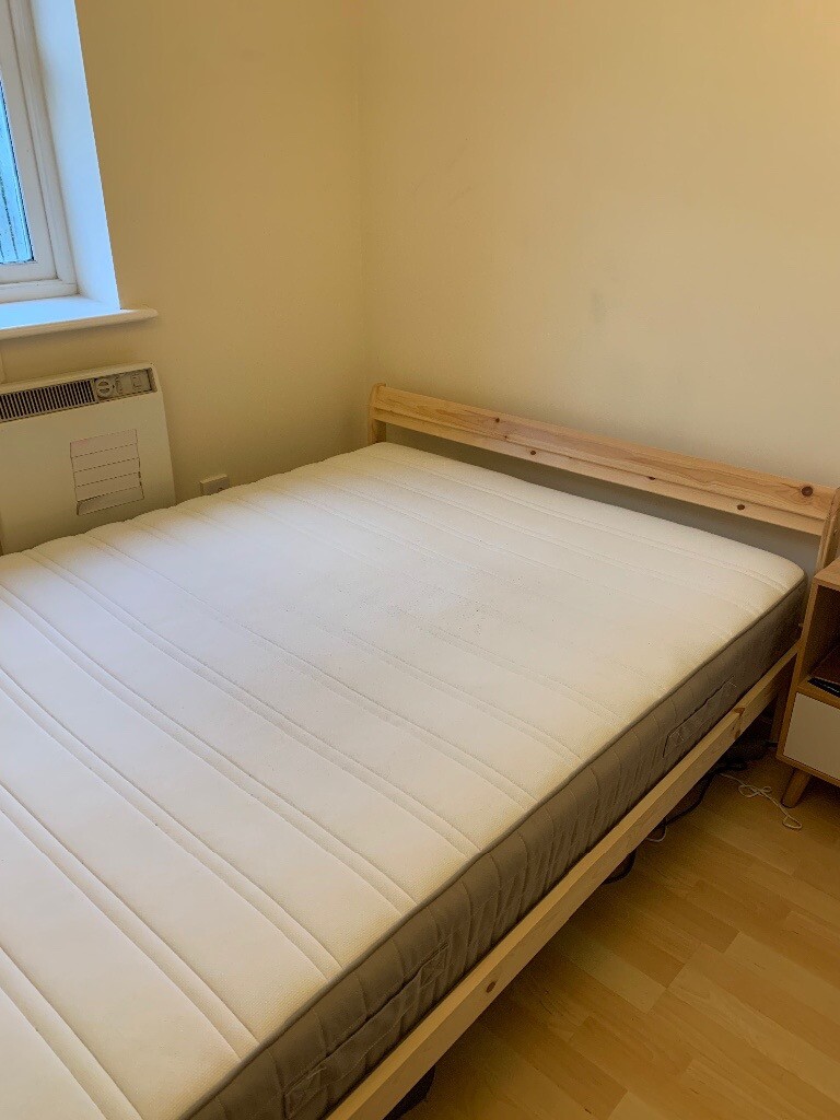 Ikea Neiden double bed frame and Ikea Luröy bed base in Golders Green