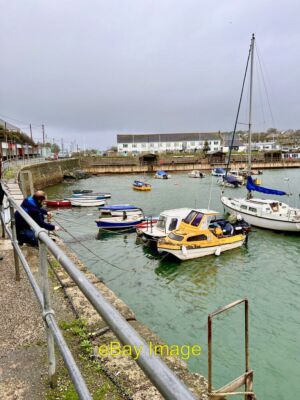 Photo 6x4 Boat owner Porthleven The boat owner securing his boat, due to  c2021