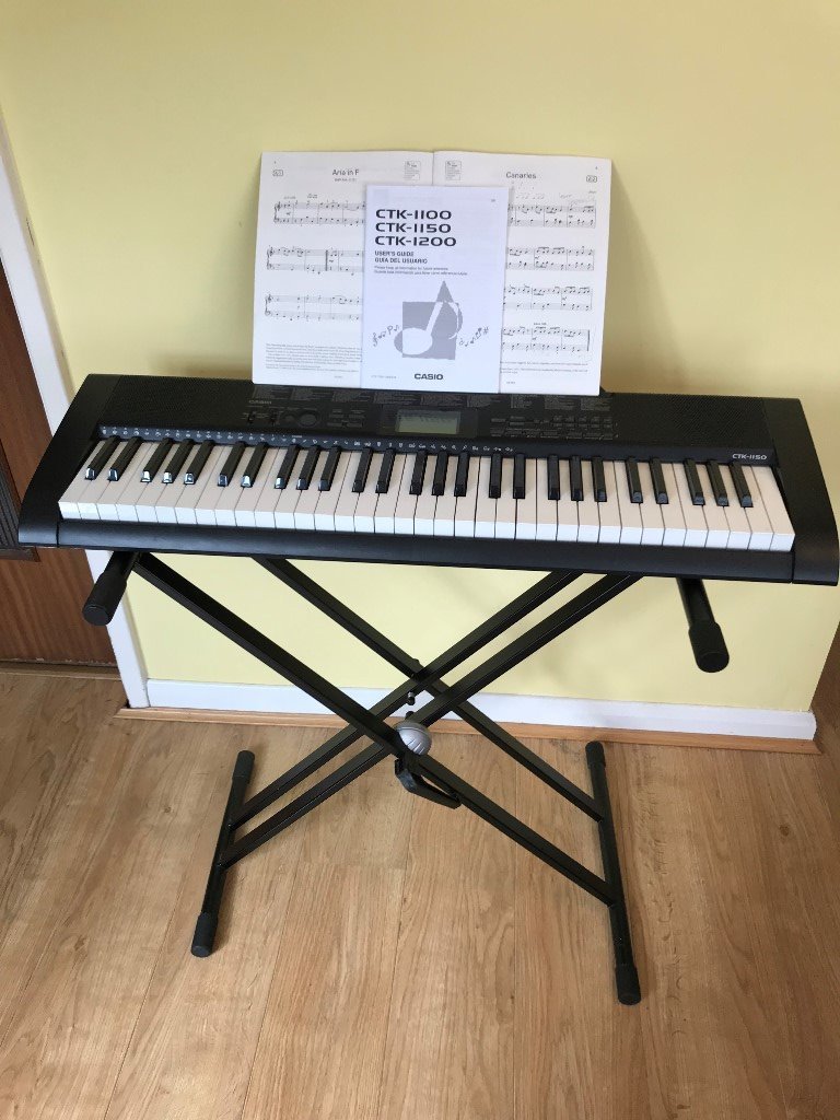 CASIO CTK-1150 Electric Keyboard with stand, power adaptor, instruction  manual