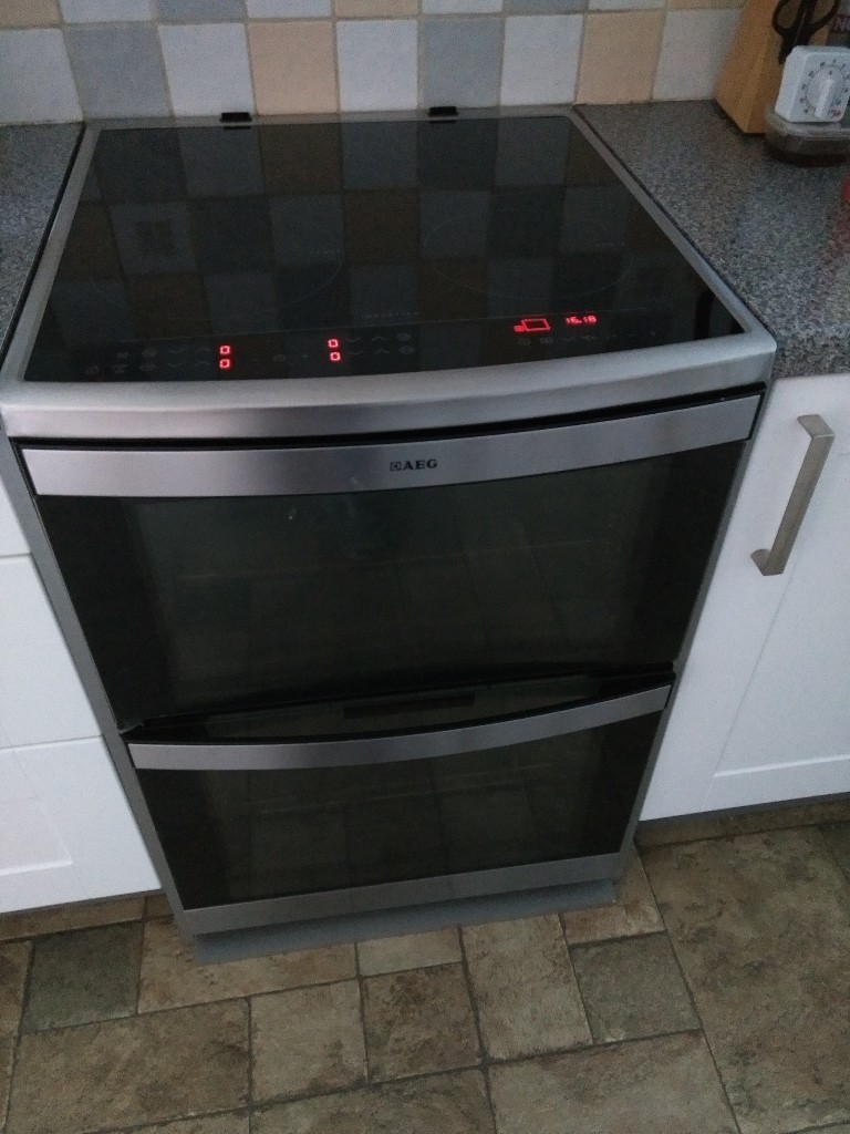 AEG Electric freestanding 60cm cooker (model 49106IUMN) with induction