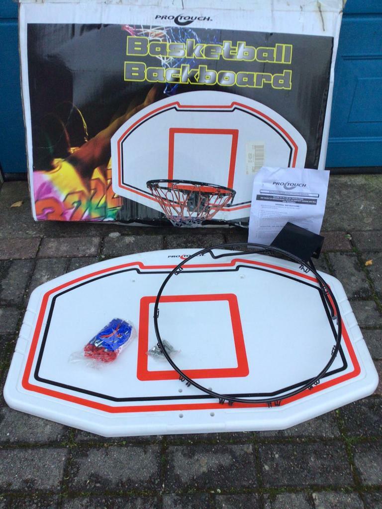 Brand new Pro touch basketball backboard with net and attachments. in