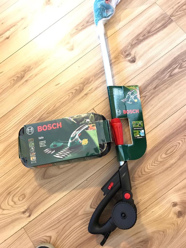 Bosch Isio cordless garden trimmer and telescopic handle in Ruislip