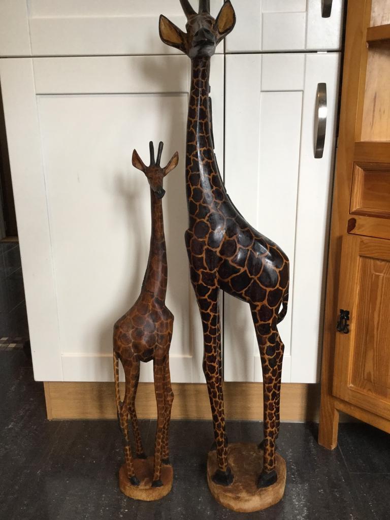 Mother and baby wooden giraffe ornaments in Newtownards, County Down