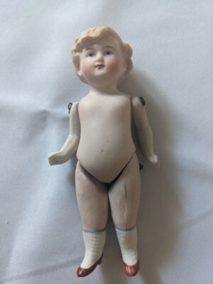 5 1/4'' Bisque Stiff-neck type Girl Doll, Germany stamped with No. 9770 over 0
