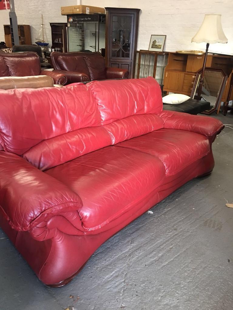 ** BURGUNDY LEATHER SOFA IN GOOD CONDITION ** in Larne, County Antrim
