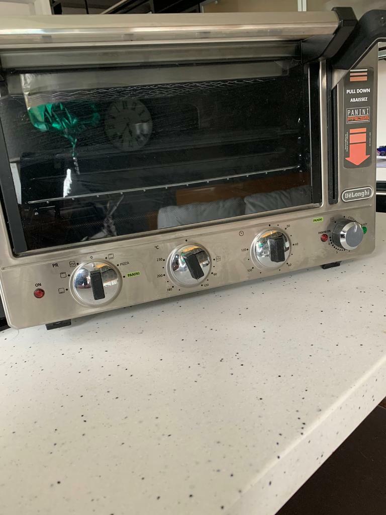 DeLonghi Panini Press. Pizza oven, mini oven and grill. Never used