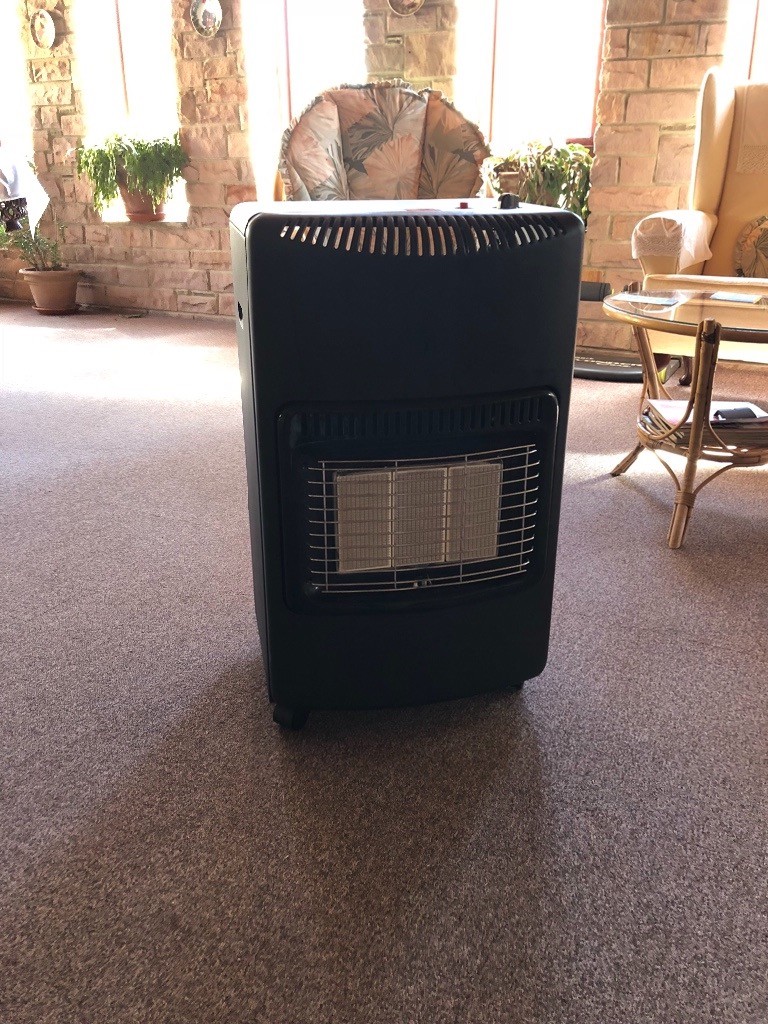 Portable Butane Gas heater for sale. includes 15k Gas bottle ( half