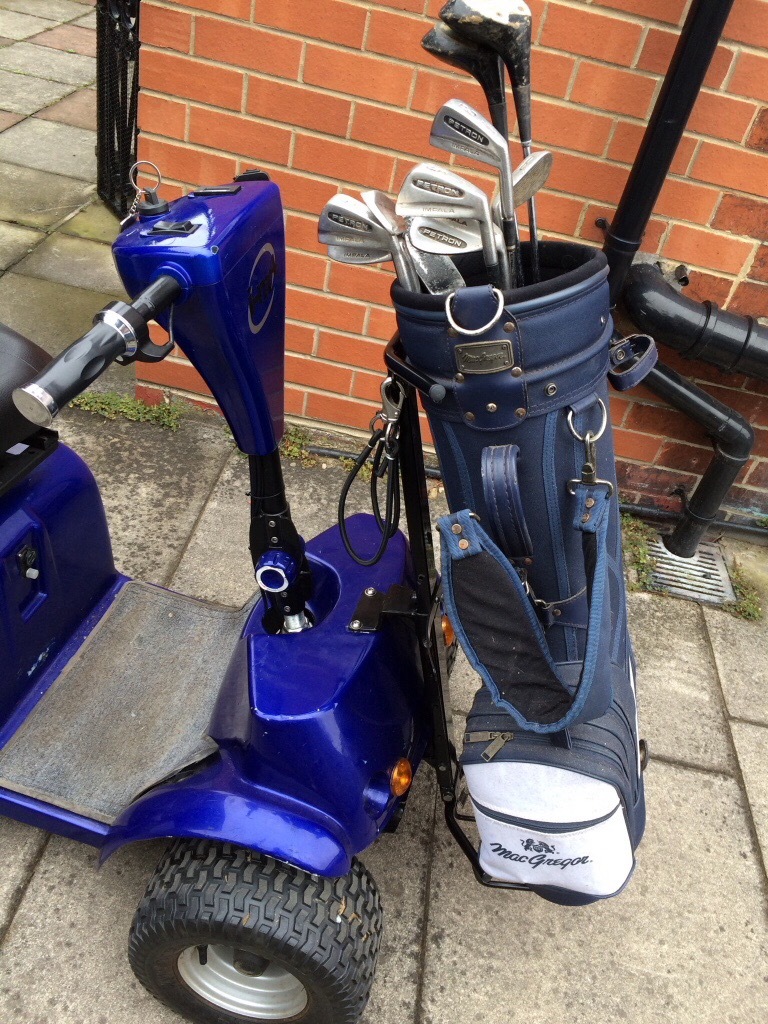 Golf buggy and ramps for sale. IM4. Includes brand new bag holder and